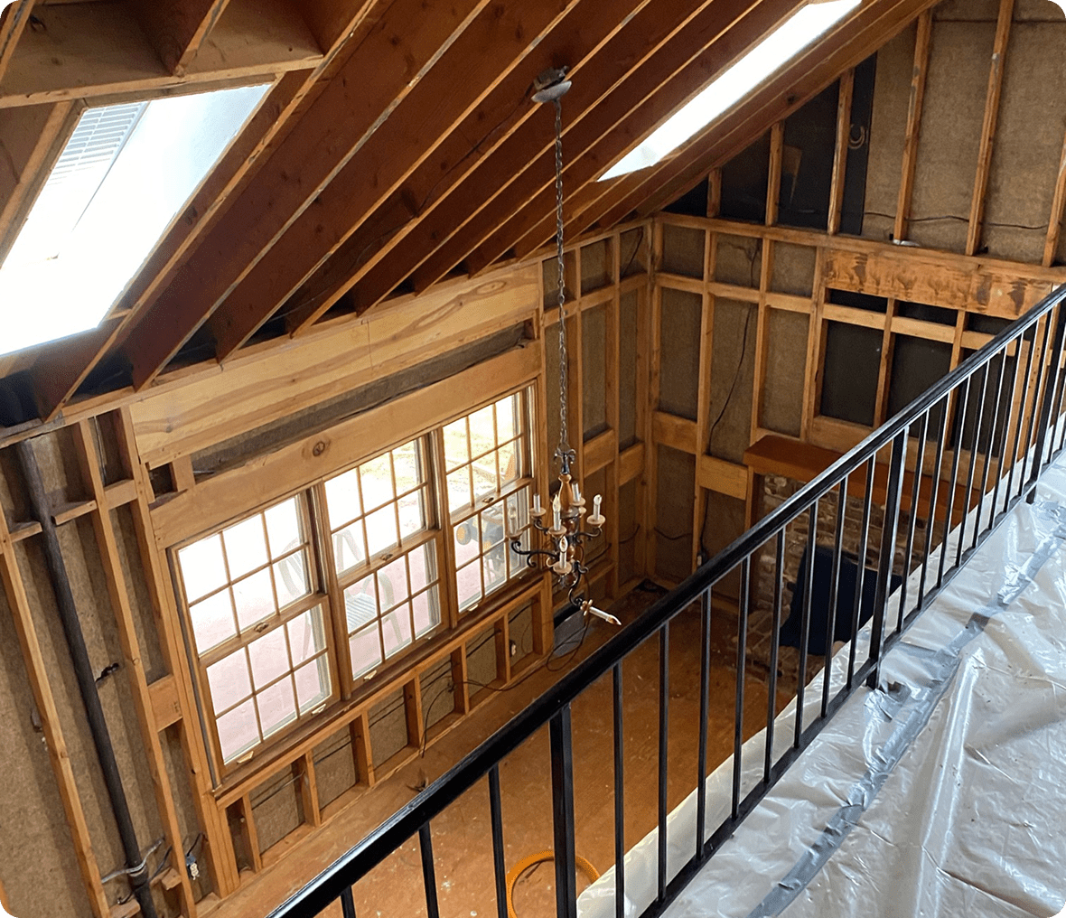 Unfinished attic with large windows